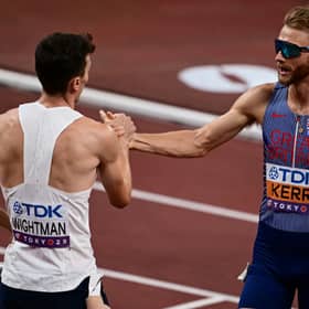 Great Britain's Scottish duo Jake Wightman and Josh Kerr react after the men's 1500m semi-final during the World Athletics Championships in Tokyo. (Photo by YUICHI YAMAZAKI/AFP via Getty Images)          