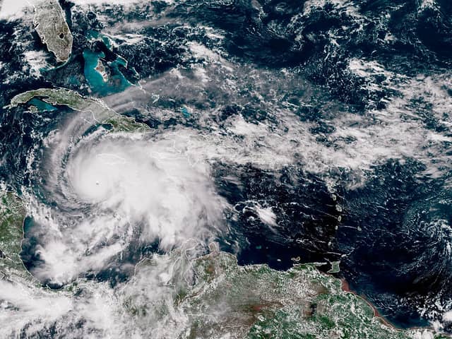 Hurricane Melissa pictured by satellite as it churned northwest through the Caribbean Sea on Monday evening