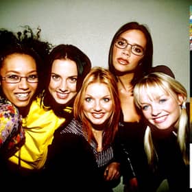 What other huge albums of 1996 did Spice Girls' immortal debut album, Spice, keep off the top of the charts - and which one knocked them off the top briefly?