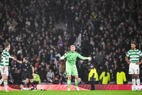 Celtic keeper Kasper Schmeichel tries to rally his teammates.