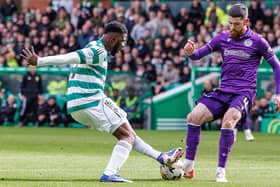 Kelechi Iheanacho of Celtic battles with Liam Donnelly of St Mirren