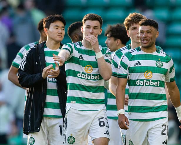 Celtic players take the acclaim of supporters after the win over Falkirk.