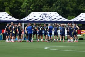 Scotland players receive instructions during a training session at Atrium Health Performance Park