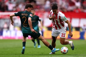 Olivier Deman of Werder Bremen battles for the ball with Jahmai Simpson-Pusey of FC Koln (Pic: Getty)