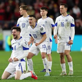 Armin Gigovic and Ivan Basic of Bosnia and Herzegovina celebrate during the penalty-shoot-out in the FIFA World Cup 2026 European Qualifiers KO play-off match between Wales and Bosnia and Herzegovina (Pic: Getty)