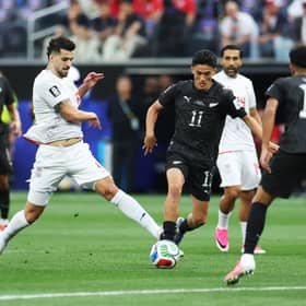 Saeid Ezatolahi of Iran and Elijah Just of New Zealand compete for the ball during the FIFA World Cup 2026 Group G match between Iran and New Zealand at Los Angeles Stadium (Pic: Getty)