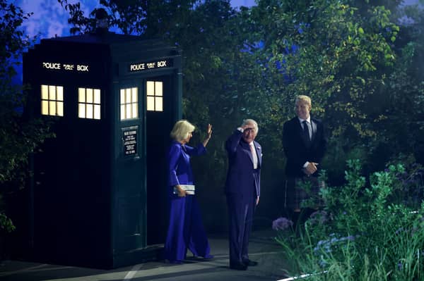 King Charles and Queen Camilla walk out of the Tardis during the opening ceremony ahead of the Glasgow 2026 Commonwealth Games at the OVO Hydro. Cr: Getty Images.