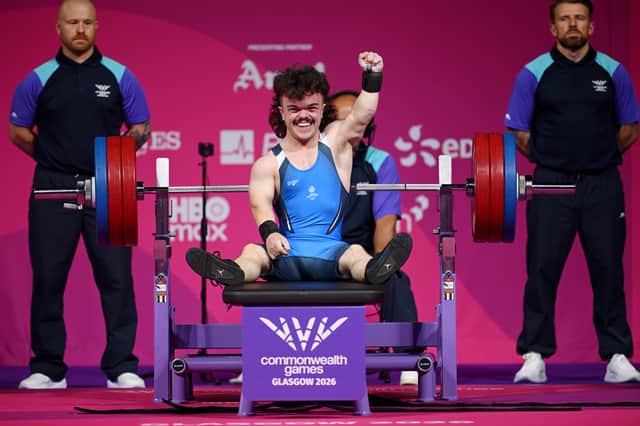 Finlay Davidson of Team Scotland celebrates after a lift in the Men's Para Powerlifting Lightweight Group B on day one of the Glasgow 2026 Commonwealth Games at SEC Armadillo.