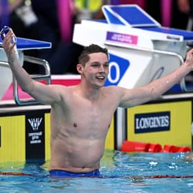 Duncan Scott of Team Scotland celebrates after winning the gold medal during the Men's 200m Individual Medley Final 