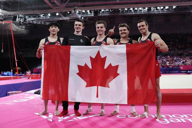Gold medalists Jordan Carroll, Rene Cournoyer, Felix Dolci, William Emard and Ethan Ikeda of Team Canada pose for a photo after their victory in Men's Team Final