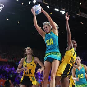Gretel Bueta of Team Australia wins the ball ahead of Shamera Sterling (L) and Latanya Wilson (R) of Team Jamaica during the Netball Gold Medal match at Birmingham 2022