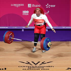 Emily Campbell of Team England reacts after winning the Women's +86kg Weightlifting