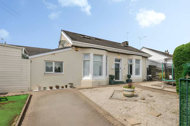 The Clydeford Drive end-terrace villa provides four-bedroom accommodation with front and rear gardens