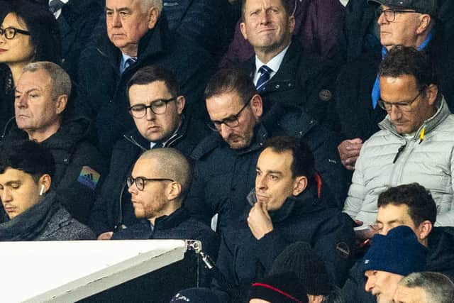 Dan Purdy, pictured next to Kevin Thelwell, during a Europa League match between Manchester United and Rangers at Old Trafford, on January 23, 2025. (Photo by Craig Foy / SNS Group)