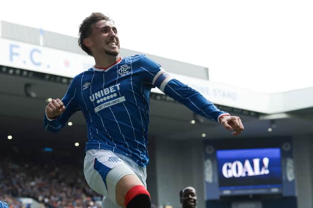 Dan Neil of Rangers celebrates scoring the opening goal against Celtic at Ibrox