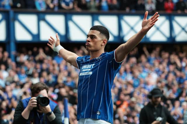 Kevin Kelsy of Rangers celebrates scoring his team's second goal against Celtic