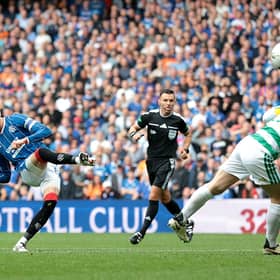  Dan Neil of Rangers scores his team's third goal during the Premier Sports Cup Quarter Final match between Rangers and Celtic at Ibrox