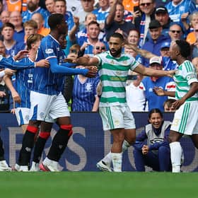 Cameron Carter-Vickers of Celtic keeps Emmanuel Fernandez of Rangers and Haissem Hassan of Celtic apart 