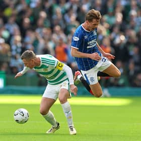 James Penrice of Rangers reacts after a challenge from Callum McGregor of Celtic 