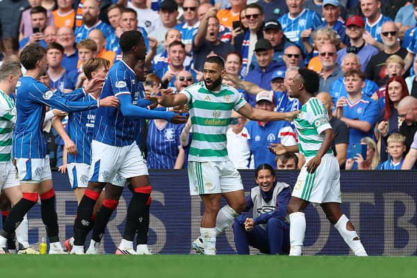  Cameron Carter-Vickers of Celtic keeps Emmanuel Fernandez of Rangers and Haissem Hassan of Celtic apart 