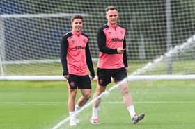 Cammy Devlin (L) and Lawrence Shankland during a Rangers MD-1 training session