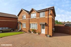 The Eastbank Rise home sits in a quiet Glasgow cul-de-sac with a driveway and electric car charger