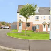 The modern Tattershall Place end-terrace home has front and rear gardens and off-road parking
