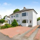 The refurbished Penilee Road home combines a private driveway with generous front and rear gardens