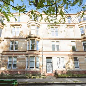 Set on a tree-lined avenue in Woodlands, this first-floor flat offers a characterful base in Glasgow's sought-after West End.
