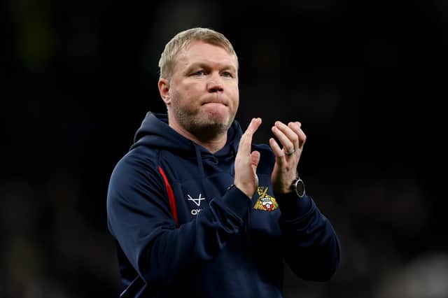 Grant McCann manages his son Bayley at Doncaster.