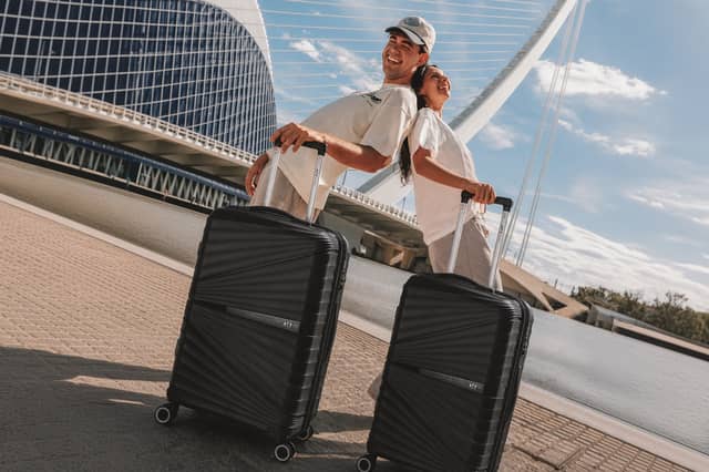 The black ATX Luggage 21-inch cabin suitcase has a 44-litre capacity, four double spinner wheels and a built-in TSA-approved lock.