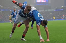 Strikers linked up for the opener at Ibrox.