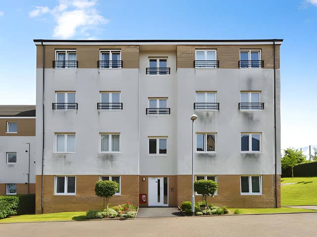 The Palmer Court development offers modern ground-floor accommodation in Bishopbriggs, with allocated parking and an open outlook towards the Campsie Fells