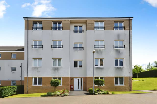 The Palmer Court development offers modern ground-floor accommodation in Bishopbriggs, with allocated parking and an open outlook towards the Campsie Fells