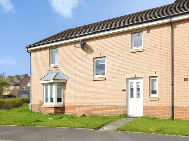 The Barn Drive terraced house offers three bedrooms, allocated parking and a convenient position close to the amenities of Cambuslang