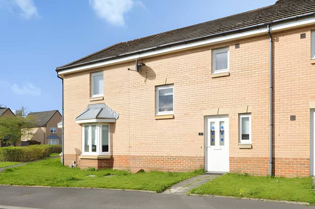 The Barn Drive terraced house offers three bedrooms, allocated parking and a convenient position close to the amenities of Cambuslang