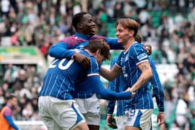 Ryan Naderi, Djeidi Gassama and James Penrice of Rangers celebrate after the William Hill Premiership 2026/27 match between Celtic and Glasgow Rangers at Celtic Park