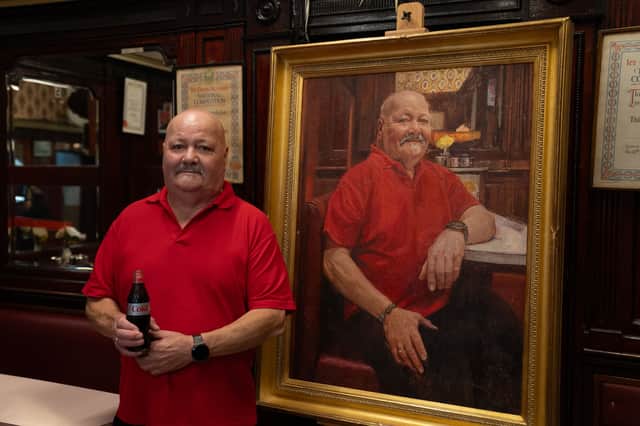 Gino with his portrait