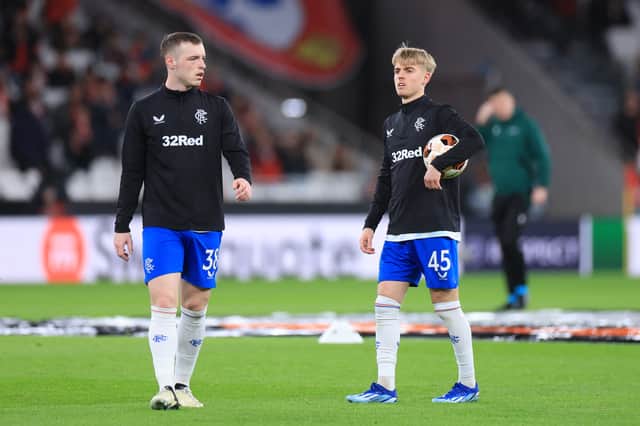 Winger (right) had a chance to leave the club in the summer but declined.