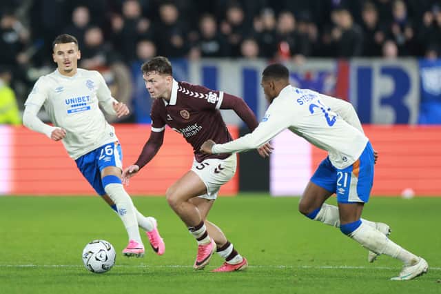 Bouanani (left) bagged the assist for the equaliser at Hearts.