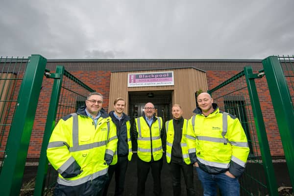Warden Construction team at one of its completed projects