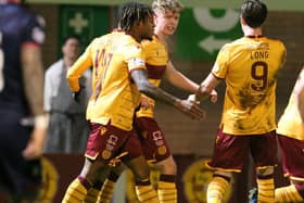 Mark O'Hara celebrates his goal against Ross County on Wednesday night with team-mates Rolando Aarons and Chris Long (Pic by Ian McFadyen)