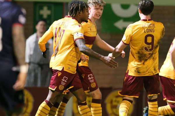 Mark O'Hara celebrates his goal against Ross County on Wednesday night with team-mates Rolando Aarons and Chris Long (Pic by Ian McFadyen)