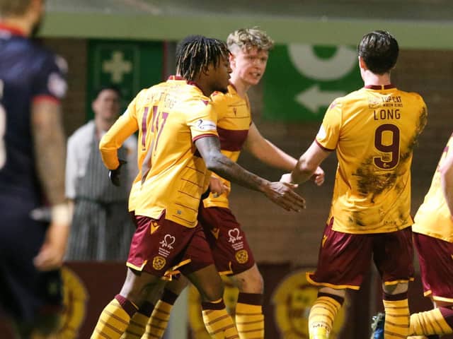 Mark O'Hara celebrates his goal against Ross County on Wednesday night with team-mates Rolando Aarons and Chris Long (Pic by Ian McFadyen)