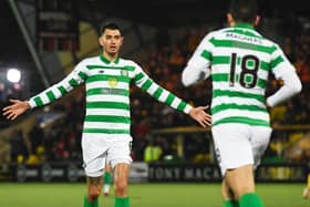 Celtic's Nir Bitton celebrates with Tom Rogic after his injury-time equaliser against Livingston. Picture: Craig Foy / SNS