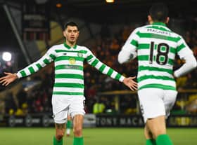 Celtic's Nir Bitton celebrates with Tom Rogic after his injury-time equaliser against Livingston. Picture: Craig Foy / SNS