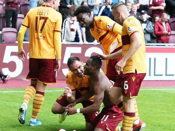 Motherwell players celebrate Sherwin Seedorf's stunning goal in the 3-2 win at Tynecastle last September (Pic by Ian McFadyen)