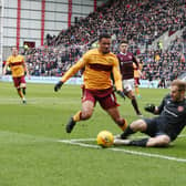 Hearts keeper Bobby Zlamal challenges Motherwell's Jermaine Hylton (Pic by Ian McFadyen)