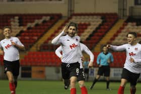Ray Grant celebrates his goal, to the delight of Tom Lang and Mark Lamont (pic: Craig Black Photography).