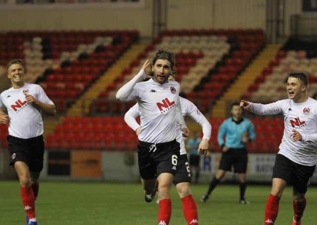Ray Grant celebrates his goal, to the delight of Tom Lang and Mark Lamont (pic: Craig Black Photography).